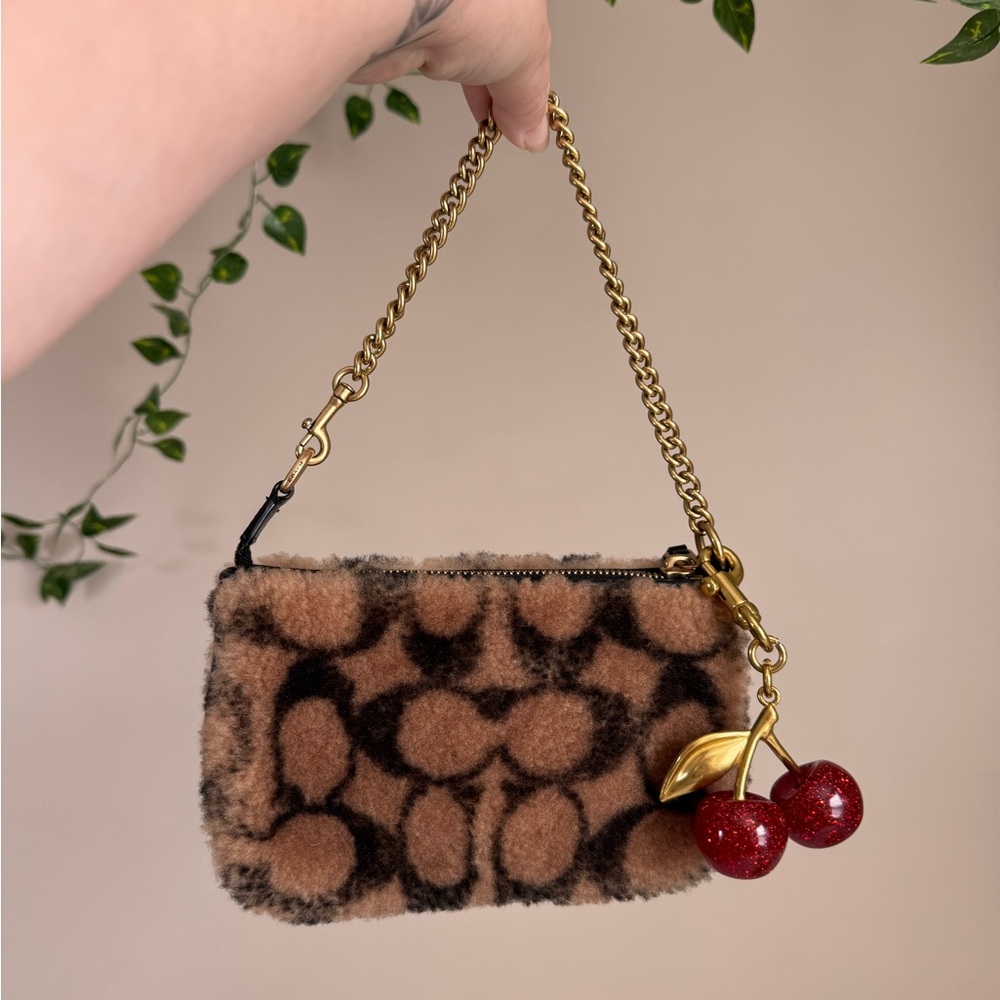 Coach X Jennifer López Nolita 19